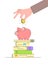 Education savings concept with cute piggy bank