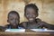 Education Symbol: Couple of African Children Smiling at School