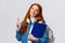 Education, teenagers and student lifestyle concept. Cheerful redhead lovely girl with backpack and folder, bring her