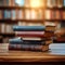 Educational ambiance Book stack in library, table, and learning