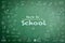 Educational back to school concept with doodle freehand white chalk drawing on green chalkboard