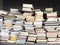 Educational books piled on table