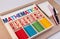 Educational kids math toy wooden board stick game counting set in kids math class kindergarten.