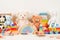 Educational kids toys collection. Teddy bear, wood plane, train, abacus, rainbow, wooden educational baby toys on white