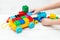 Educational toys. The child plays with the Lego designer