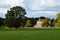 The Eerde Castle seen from the back side at the end of a meadow, Province of Overijssel