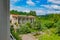 Eerie Abandoned Sanatorium with Broken Windows and Doors Overgrown by Nature's Power