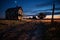 Eerie Farmhouse Under Starlight: Nature\\\'s Reclamation of Time Past