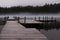 Eerie wooden pier at dusk