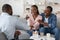 After Effective Therapy. Joyful Black Couple Handshaking With Marital Counselor After Session