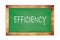 EFFICIENCY text written on green school board