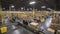 Efficient and seamless flow of cardboard box packages in a vibrant warehouse fulfillment center