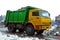 Efficient waste removal Garbage trucks in action, emptying containers isolated