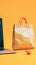 Effortless online shopping paper bag on laptop, seamless experience