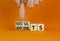 Efforts and results symbol. Concept words Efforts and results on wooden cubes. Businessman hand. Beautiful orange table orange