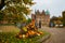 Egeskov Slot , Denmark, Halloween: Scarecrows and pumpkins decorate the entrance to the bridge to the Egeskov Castle in autumn