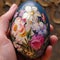 Egg adorned with vibrant, delicate flowers, showcasing nature\\\'s artistry on a small canvas