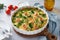 Egg-based frittata, omelette with salmon, broccoli and spinach. Crustless quiche with eggs