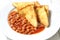 Egg bread toast and baked bean in tomato sauce
