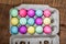 Egg carton of colorful dyed Easter eggs