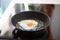 Egg frying in hot oil