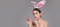 Egg hunt. Sexy bunny girl with easter egg. Sensual woman in rabbit ears. Easter banner, mockup copy space, header for