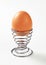 Egg in modern spiral metal egg cup