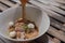 Egg Noodle in Hot and thicken soup added Pork balls, Sliced pork, pork liver sprinkle