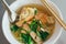 Egg noodle soup with red roast pork