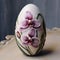 Egg painted with the image of orchid, exuding elegance and grace, capturing the essence of nature