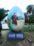An egg painted in naive painting with the image of Saint Anthony of Padua.