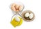 Egg slicer and boiled eggs on a white background