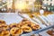 Egg tart, traditional Portuguese dessert, pastel de nata on a tray in a cafe.