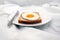 Egg Toast On The White Plate With Silver Knife