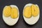 An egg with two yolks. Double yolk hard boiled egg. Close-up of an egg with two yolks