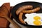 Egg and veal sausage breakfast isolated