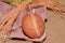 egg on which small sweet plants are glued with tape in a pink box with natural vintage decoration, easter vitage design