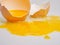 Egg yolk on a broken egg shell