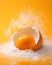 Egg yolk in shell on orange background. AI generative