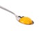 Egg yolk on a silver spoon