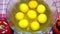 Egg yolks in the amount of eight pieces in a glass bowl