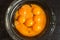 Egg yolks in a plate on the table