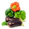 Eggplant and colorful peppers on white background