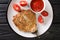 Eggplant Omelet Tortang Talong served with ketchup close-up on a plate. horizontal top view