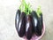 Eggplant in a pink basket