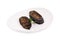 Eggplant roasted on a white plate isolated