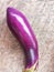 An Eggplant on Wooden Surface