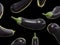 Eggplants on black background