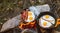 eggs with bacon cooking with oil with firewood in an outdoor camping in high resolution and sharpness