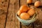 Eggs in a blue bowl on rustic vintage wood